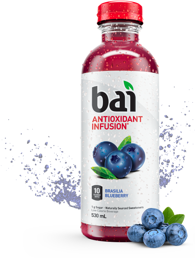 A pile of blueberries in front of a bottle of Bai Brasilia Blueberry filled with purple liquid and a blue splash in the background